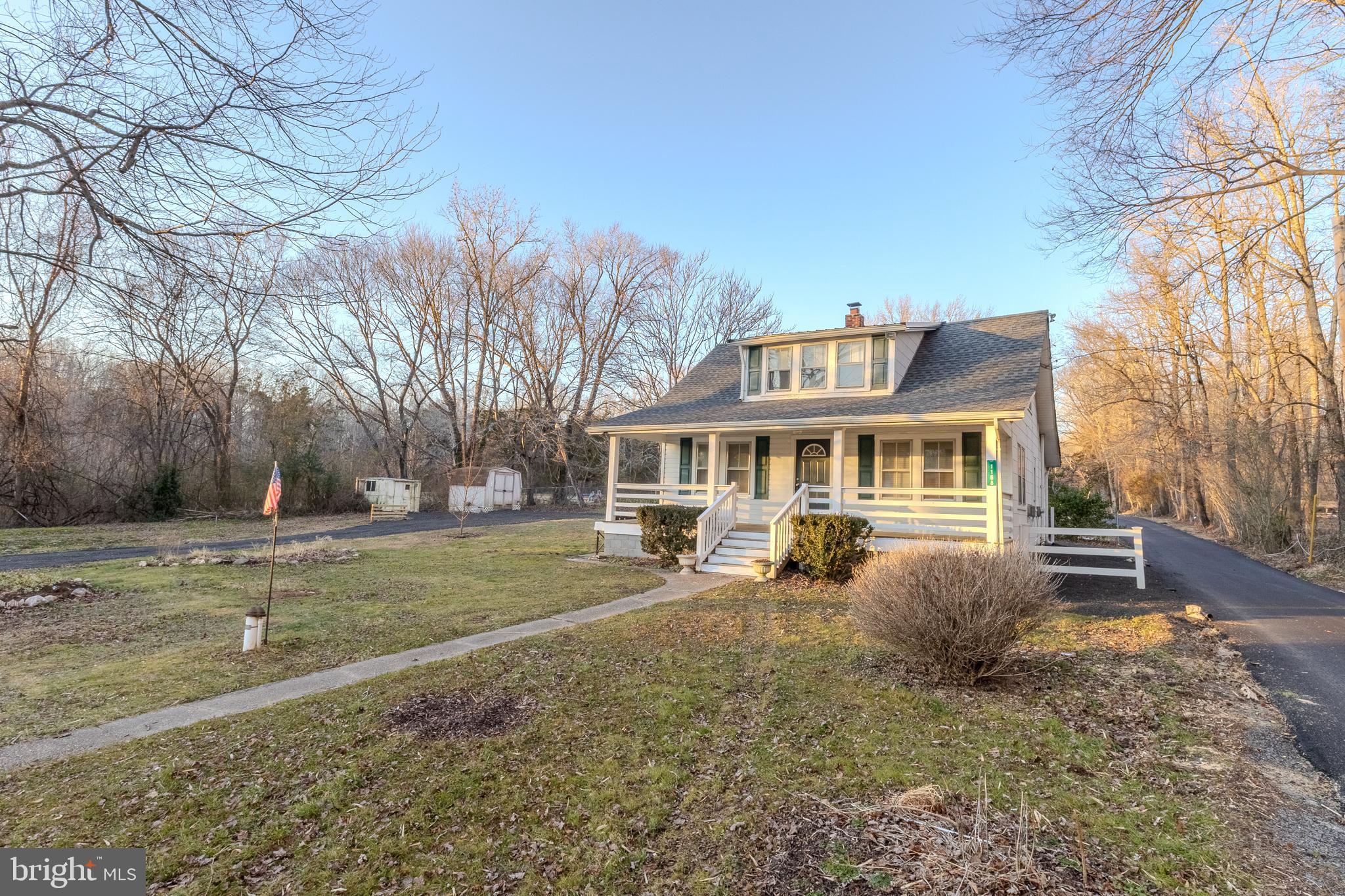 1168 Mt Zion Marlboro Road Lothian, MD 20711 - Photo 2 of 26 a front view of a house with a yard