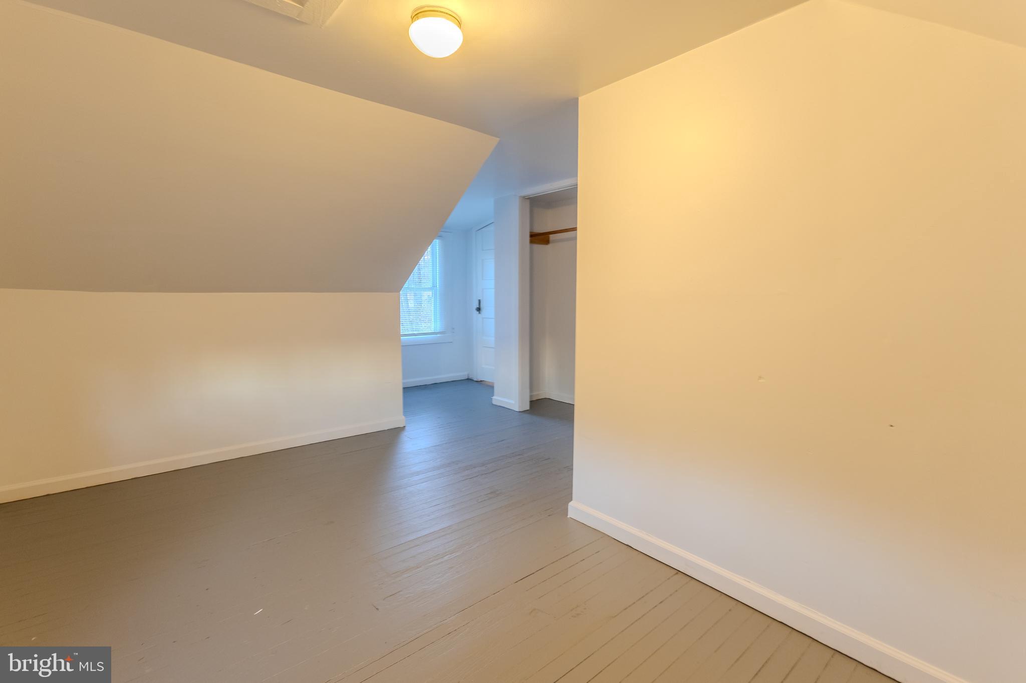1168 Mt Zion Marlboro Road Lothian, MD 20711 - Photo 22 of 26 a view of a big room with wooden floor