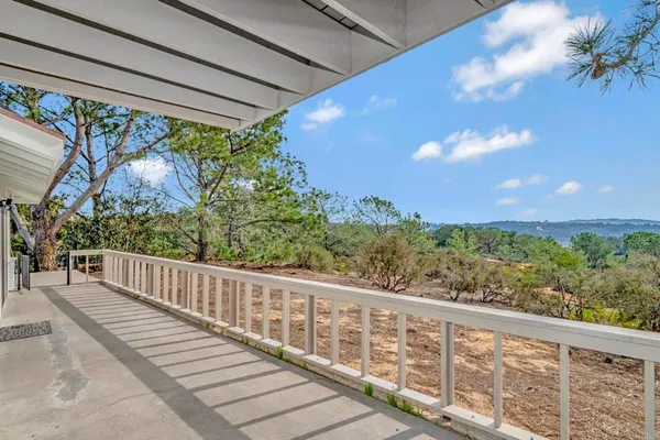 a view of a two chair in the balcony
