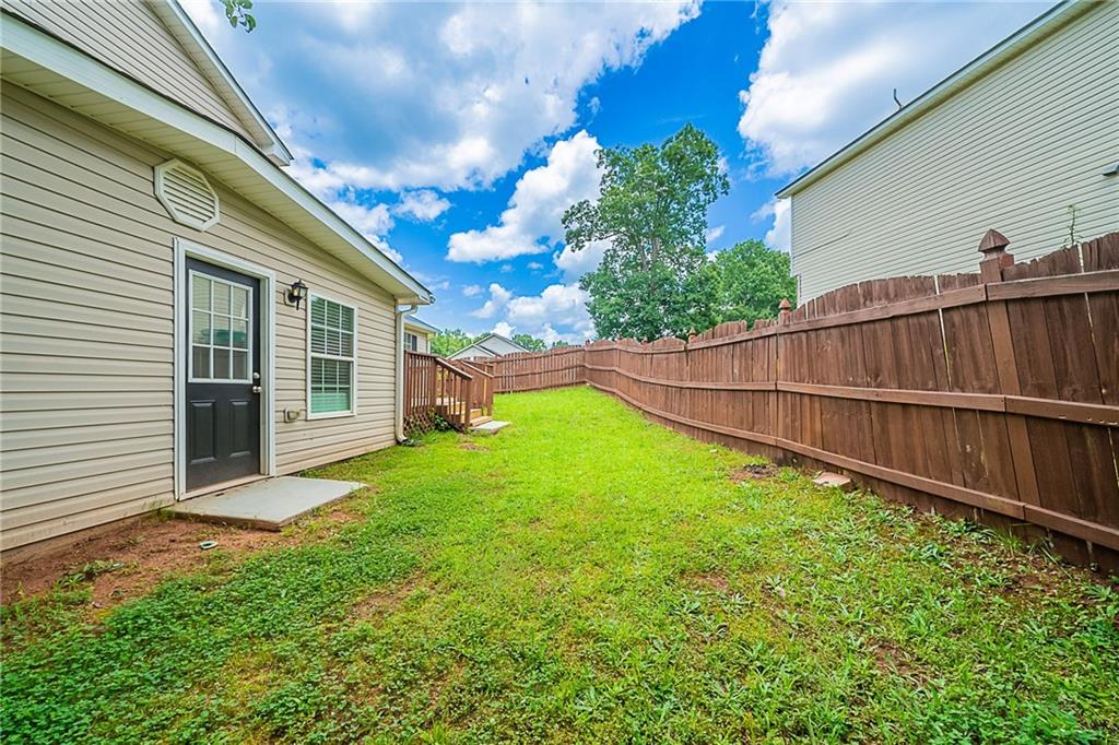 2183 Ramblewood Circle Decatur, GA 30035 - Photo 31 of 37 a view of backyard with a garden and deck