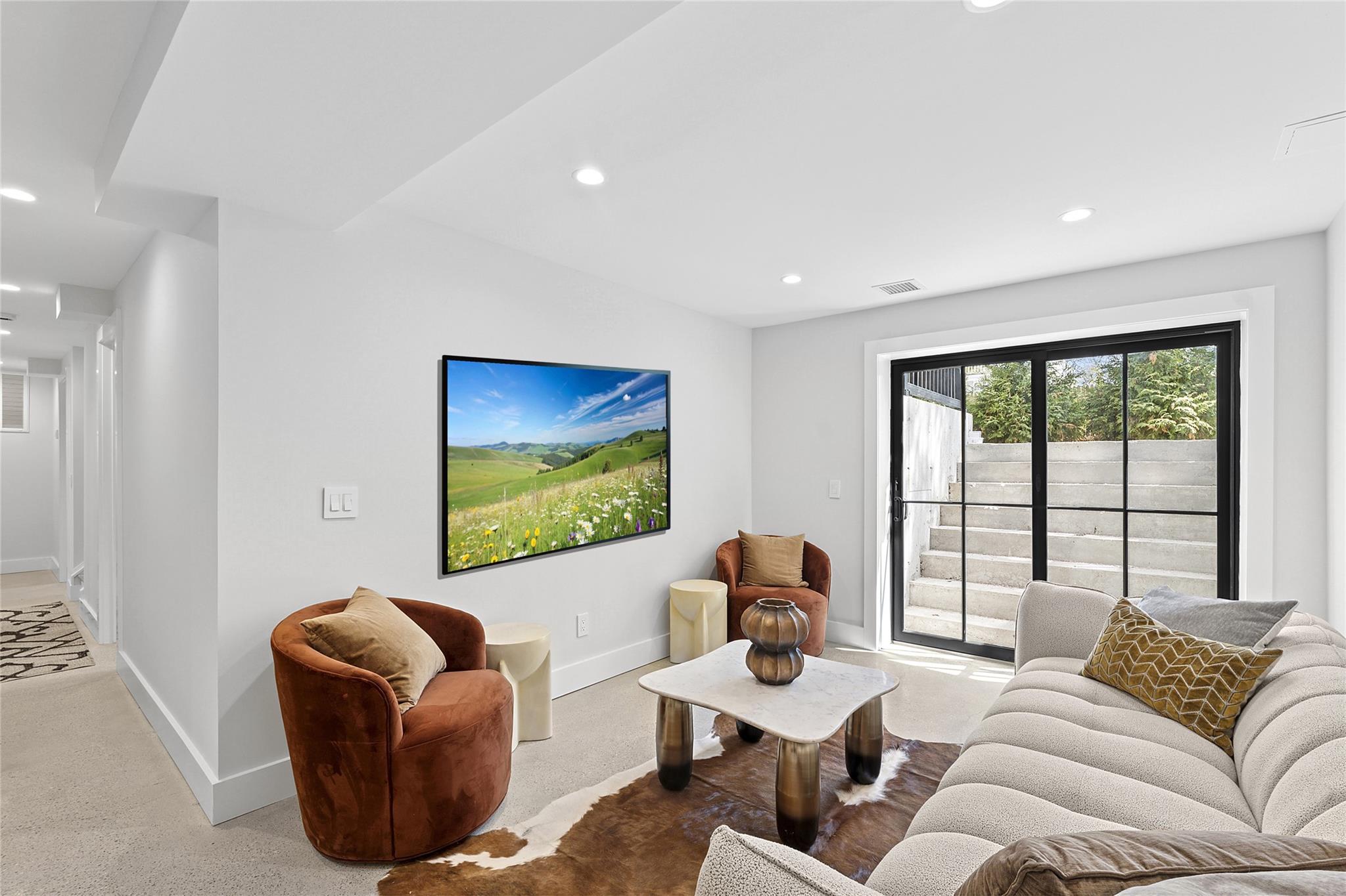 20 Boatheaders Lane North East Hampton, NY 11937 - Photo 11 of 15 a living room with furniture and a large window