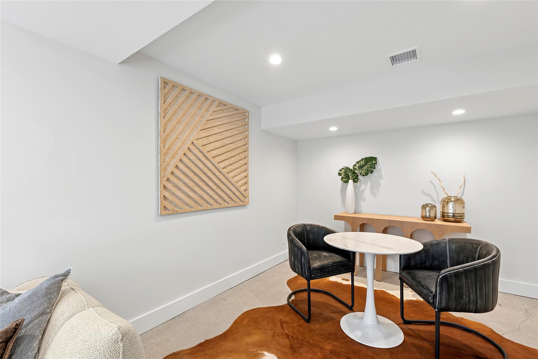 20 Boatheaders Lane North East Hampton, NY 11937 - Photo 12 of 15 a view of a dining room with furniture