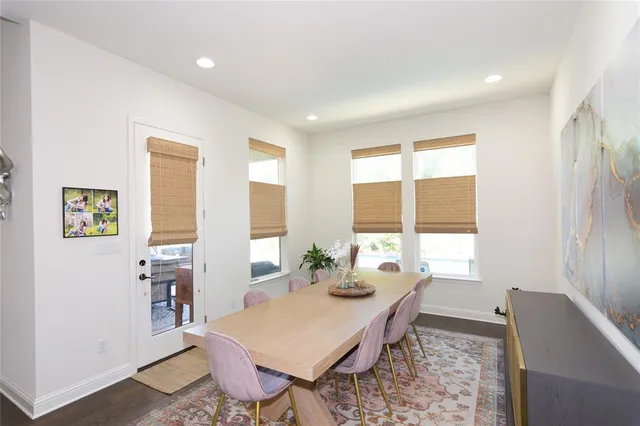 a kitchen with a sink a stove and cabinets