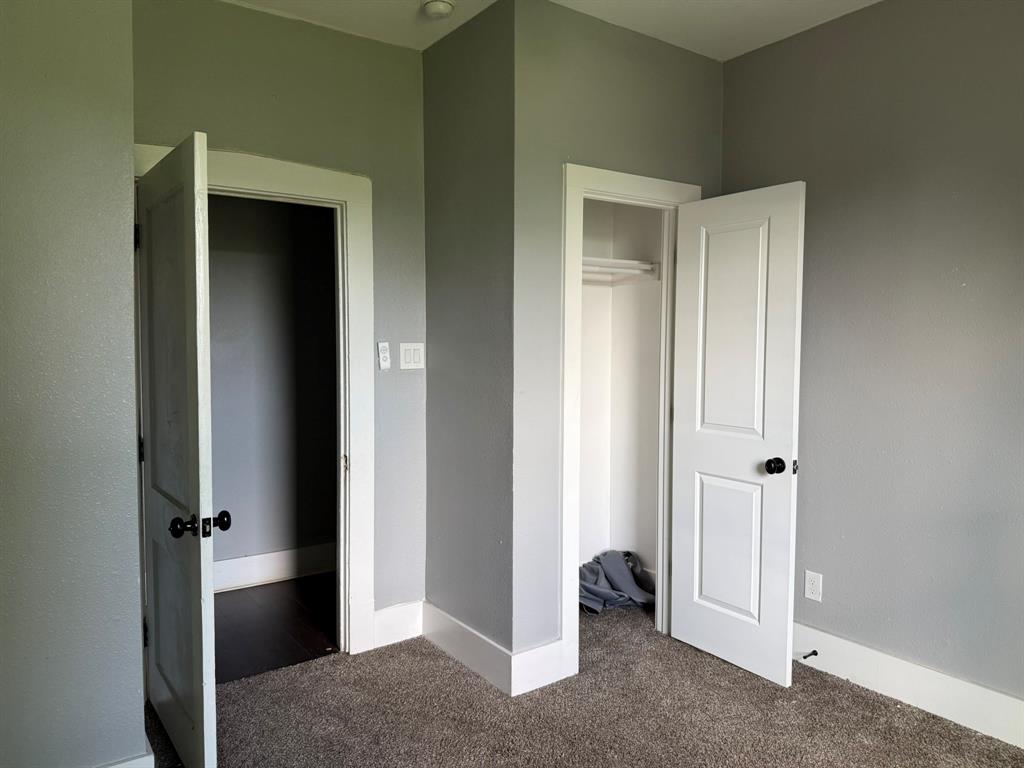 202 4th Street Joshua, TX 76058 - Photo 18 of 39 a view of an empty room with closet and a window