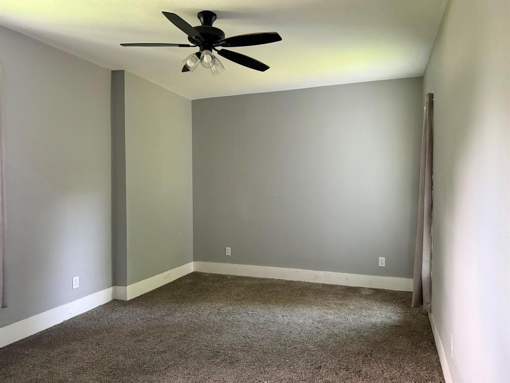 202 4th Street Joshua, TX 76058 - Photo 20 of 39 a view of a big room with carpet
