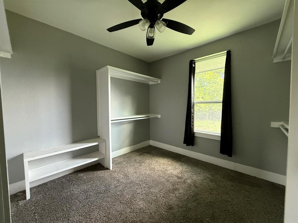 202 4th Street Joshua, TX 76058 - Photo 27 of 39 a view of a livingroom with a ceiling fan and window