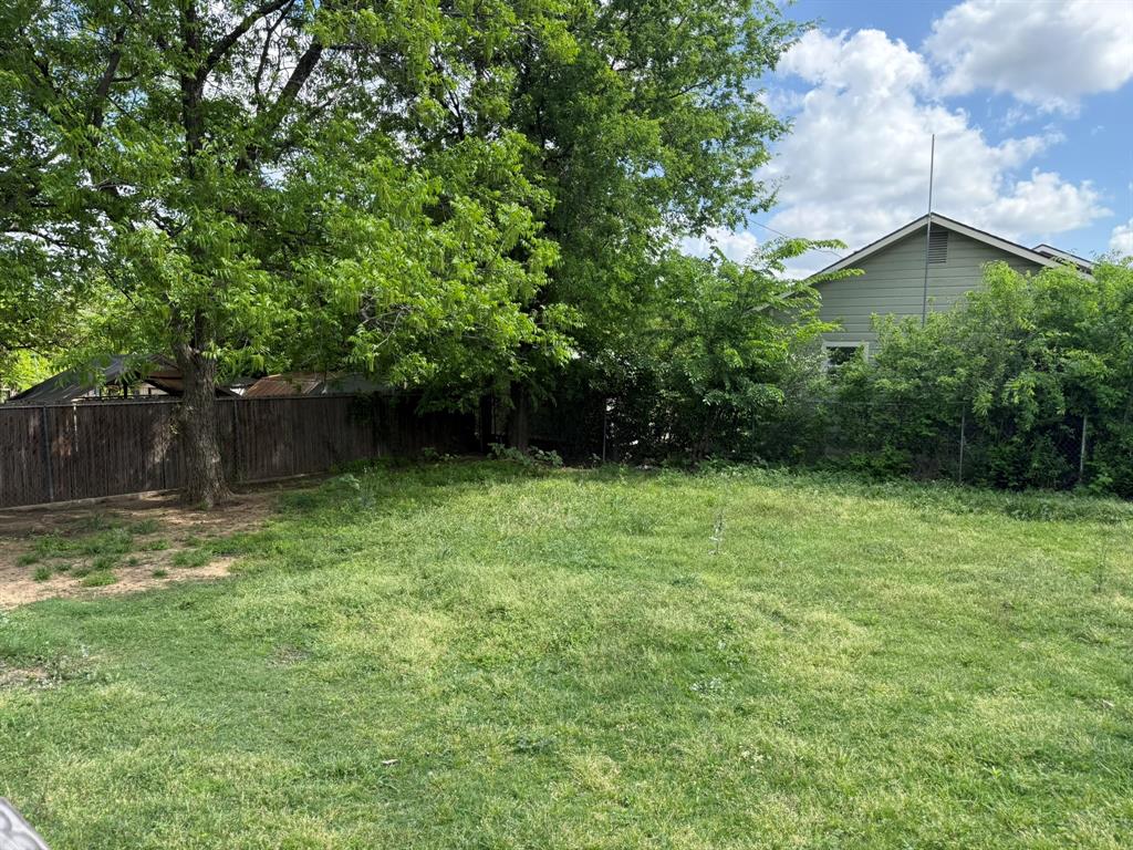 202 4th Street Joshua, TX 76058 - Photo 37 of 39 a view of backyard with green space