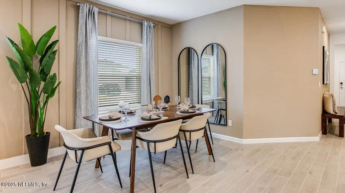 73 Whitmore Drive St. Augustine, FL 32092 - Photo 25 of 30 a view of a workspace with furniture and window