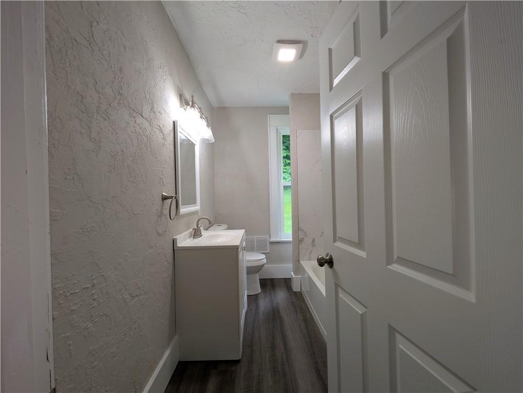 555 Steel Hill Road Mount Morris, PA 15349 - Photo 16 of 19 a bathroom with a sink mirror and toilet