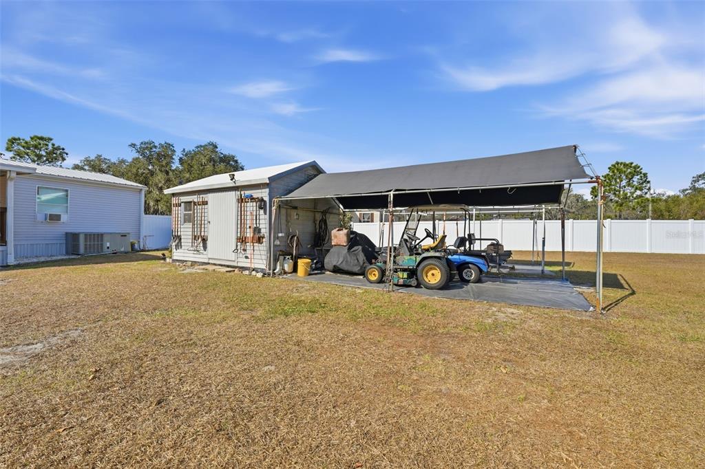 630 Otto Polk Road Frostproof, FL 33843 - Photo 13 of 44 a view of a house with a patio