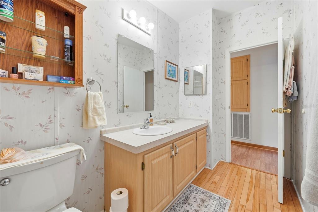 630 Otto Polk Road Frostproof, FL 33843 - Photo 35 of 44 a bathroom with a sink a toilet and shower