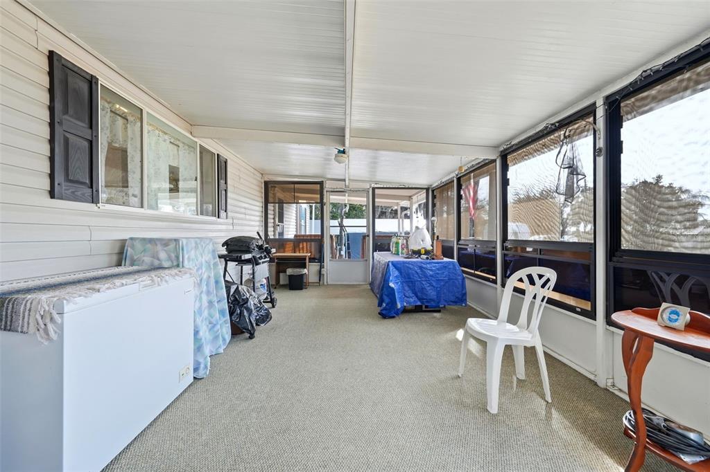 630 Otto Polk Road Frostproof, FL 33843 - Photo 44 of 44 a view of living room filled with furniture and windows