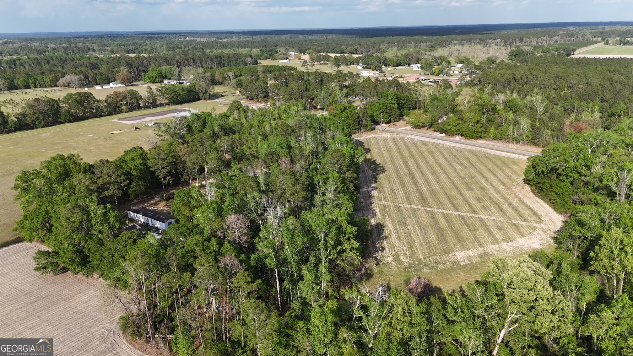 2 Spring Branch Road Baxley, GA 31513 - Photo 9 of 18 a view of a yard from a balcony