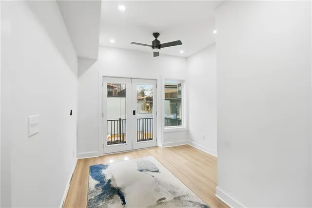 a front view of a house with a yard table and chairs