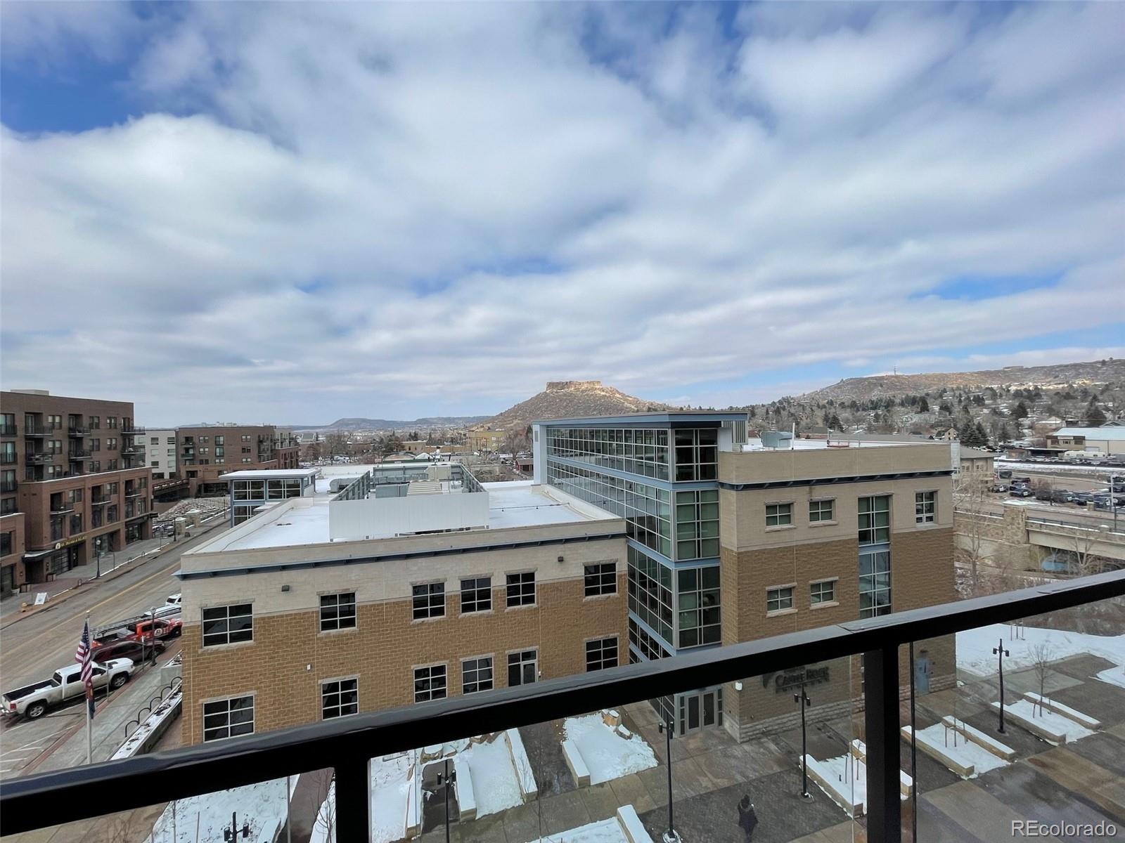 20 Wilcox Street, Unit 518 Castle Rock, CO 80104 - Photo 12 of 34 a view of a balcony with an buildings