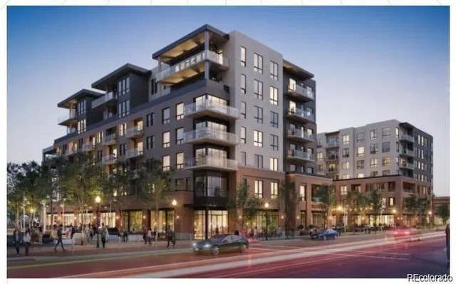 a living room with furniture fireplace and a large window