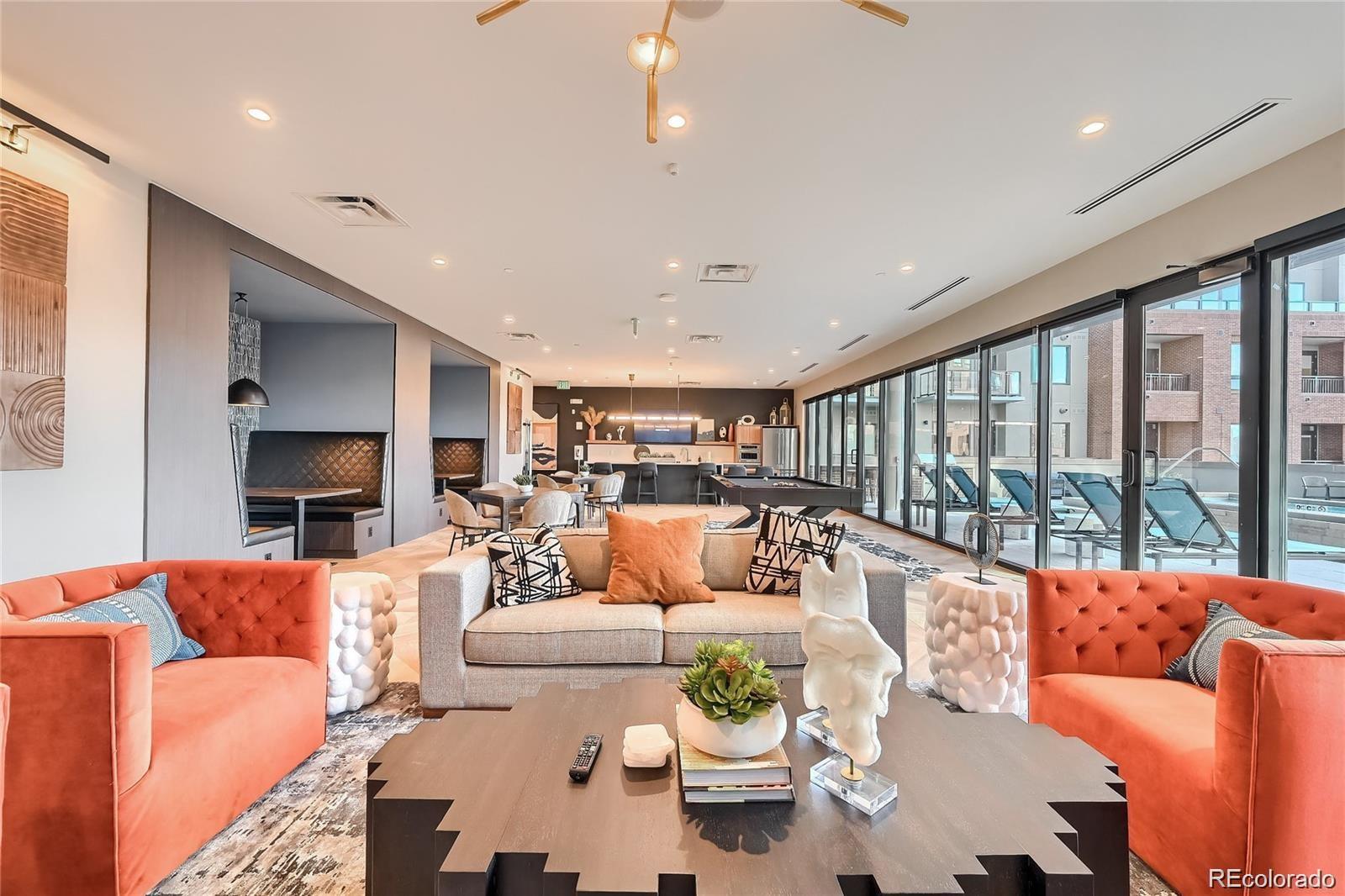 20 Wilcox Street, Unit 518 Castle Rock, CO 80104 - Photo 23 of 34 a living room with furniture fireplace and a large window