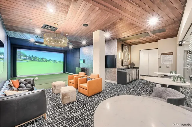 a living room with furniture pool and view of living room