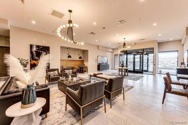 a living room with furniture pool and view of living room
