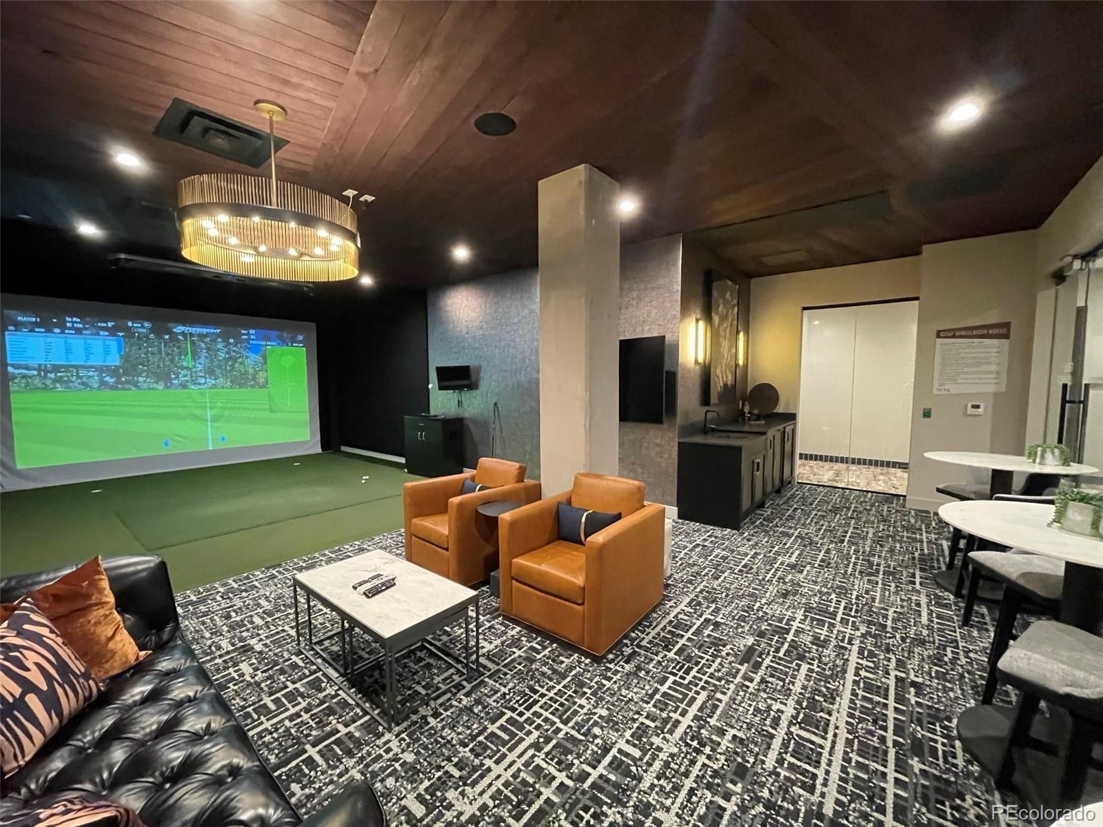 20 Wilcox Street, Unit 518 Castle Rock, CO 80104 - Photo 30 of 34 a living room with furniture a window and a flat screen tv