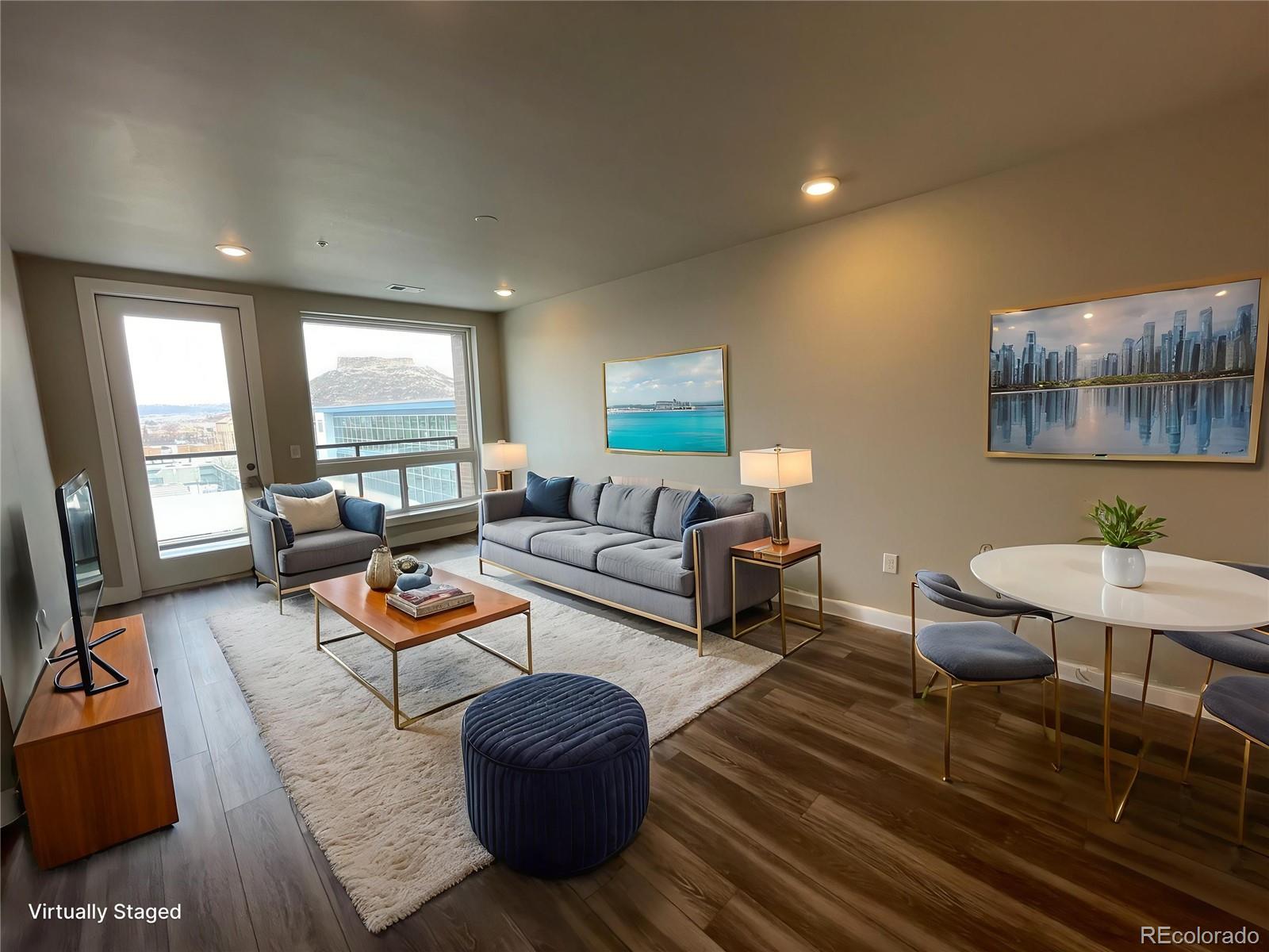 20 Wilcox Street, Unit 518 Castle Rock, CO 80104 - Photo 4 of 34 a living room with furniture and a couch
