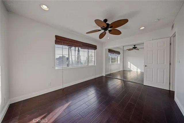 a view of a kitchen with a sink and cabinets