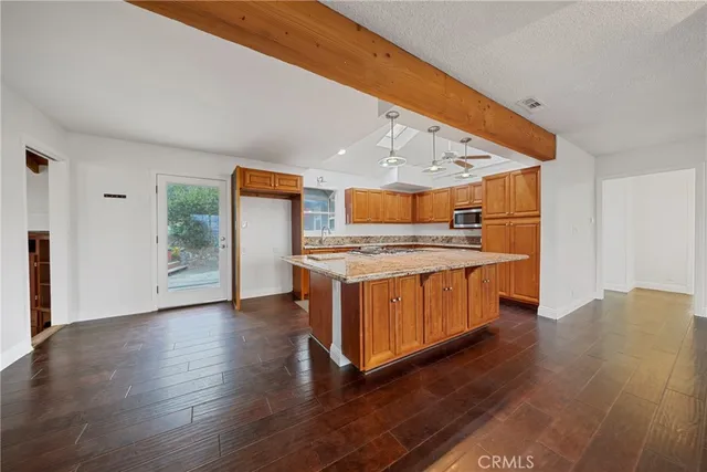 a bathroom with a bathtub sink mirror and toilet