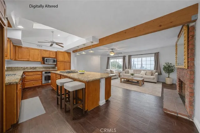 a spacious bathroom with a granite countertop sink and a mirror