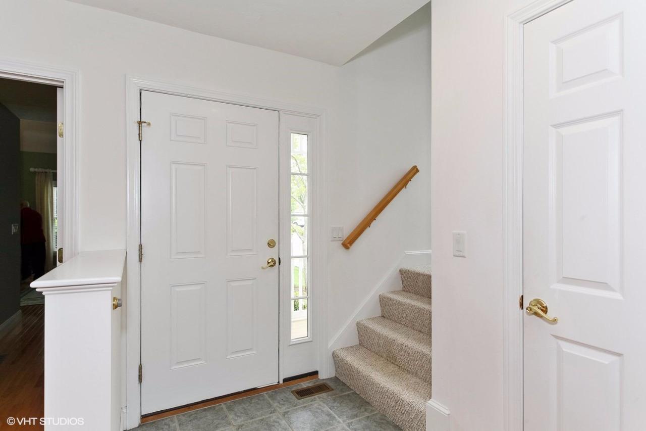 16 Turnberry Road Bourne, MA 02532 - Photo 3 of 20 a view of entryway with white walls and stairs