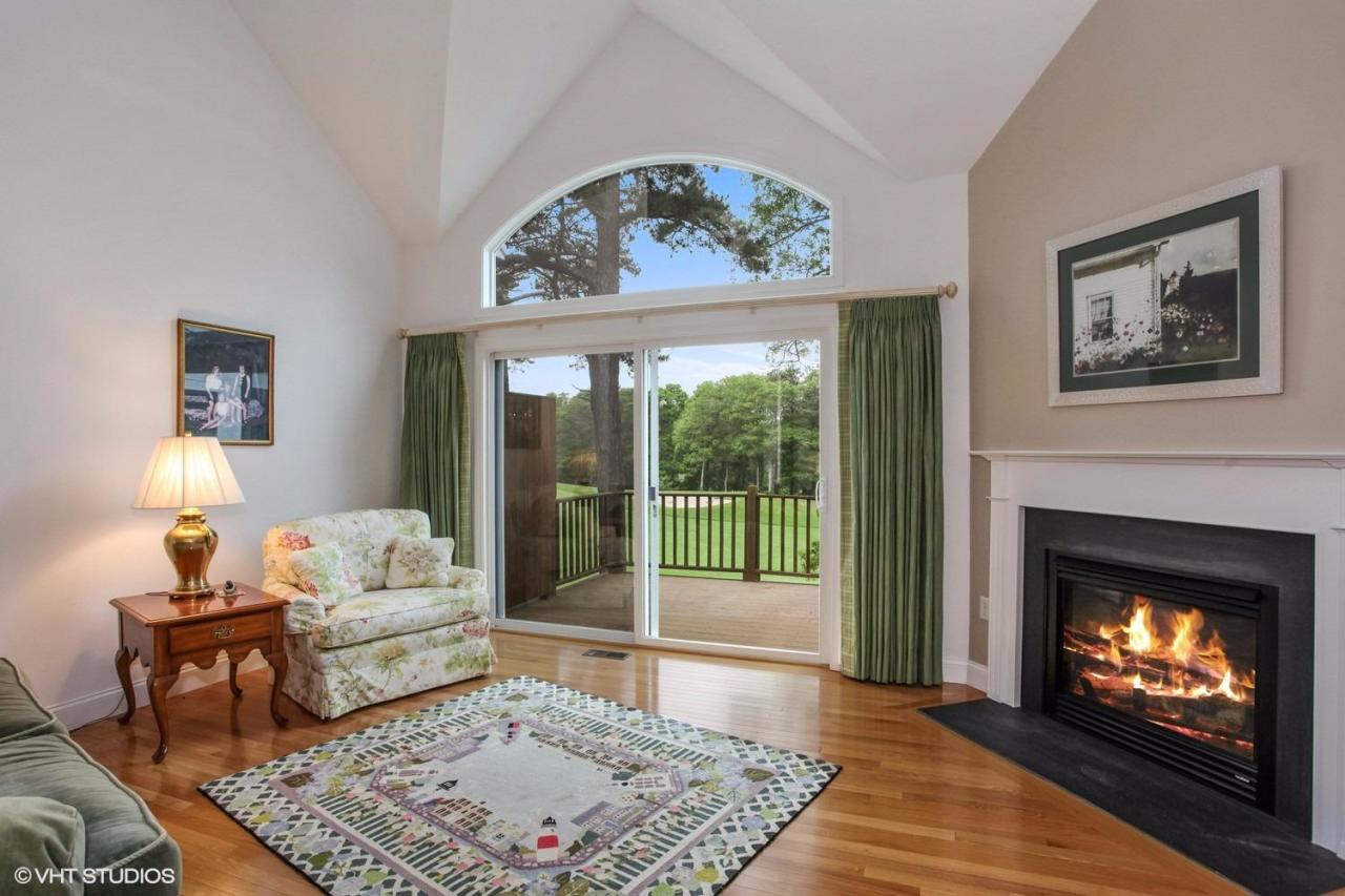 16 Turnberry Road Bourne, MA 02532 - Photo 4 of 20 a living room with furniture and a fireplace