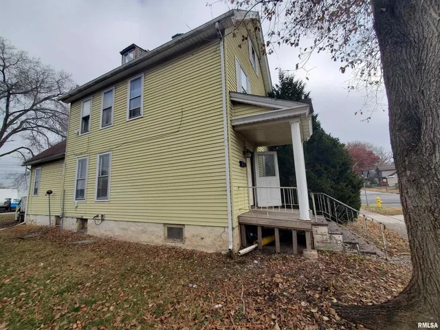 a front view of a house with balcony