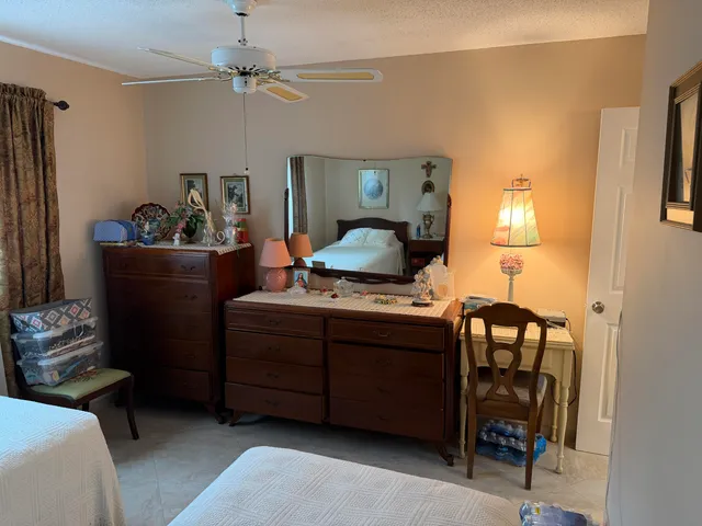 a view of a lake with houses in the back