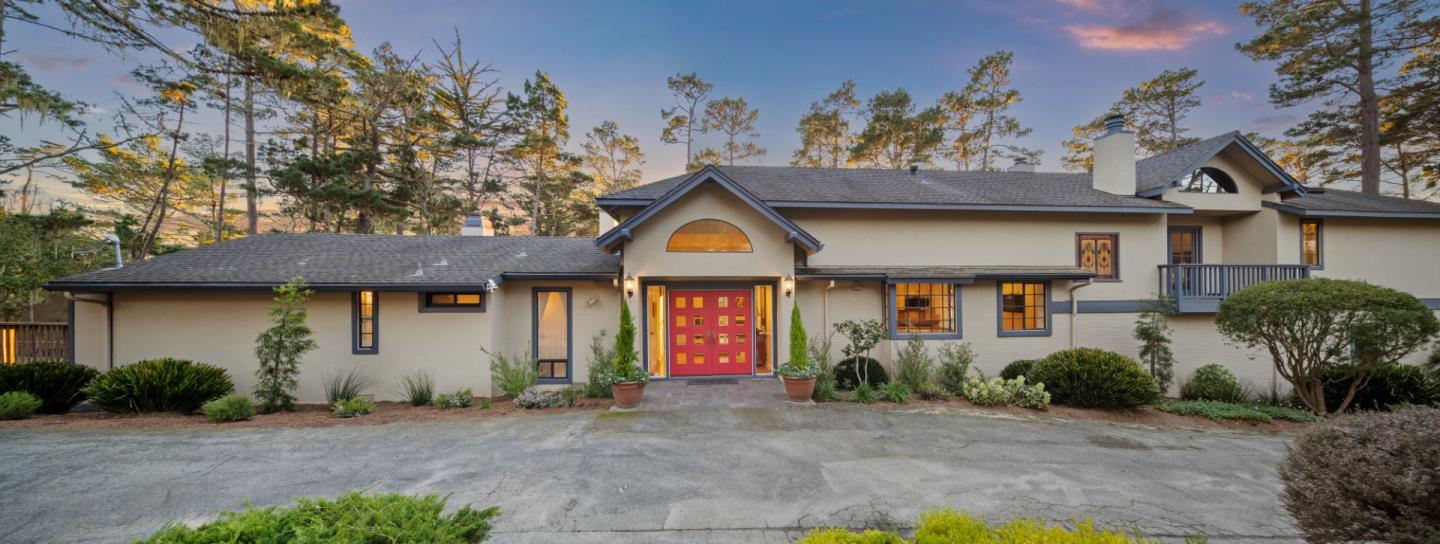 1424 Oleada Road Pebble Beach, CA 93953 - Photo 29 of 30 a front view of a house with garden
