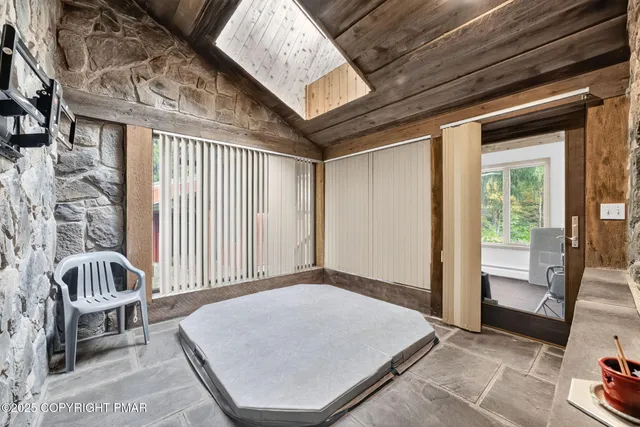 a view of balcony with wooden floor