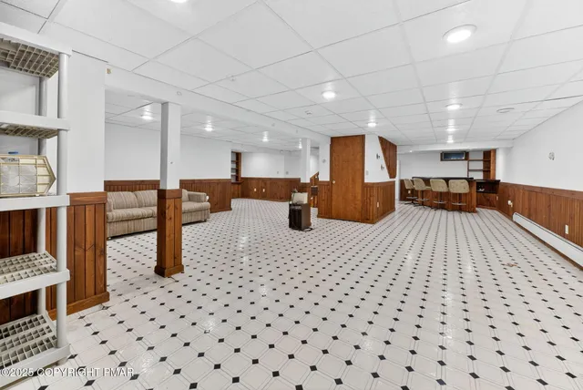 a balcony with view of trees in front of it