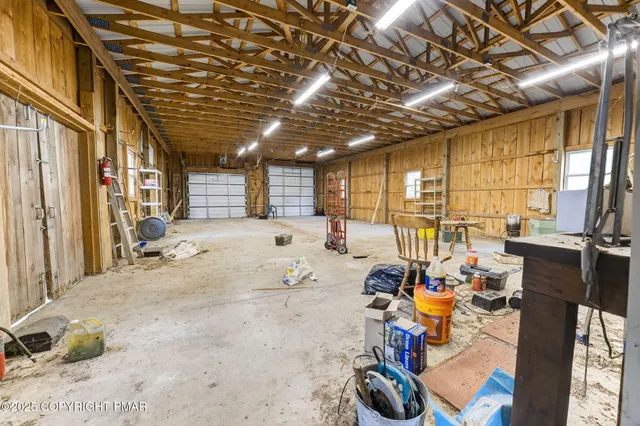 a view of a city with lush green forest