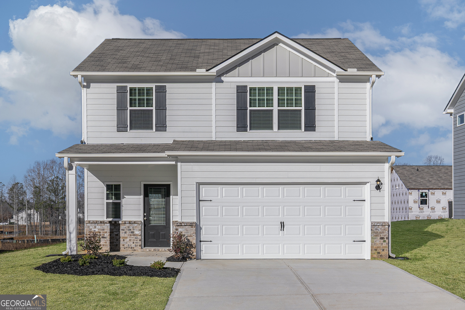 622 Mackenzie Cove Villa Rica, GA 30180 - Photo 2 of 14 front view of a house with a yard