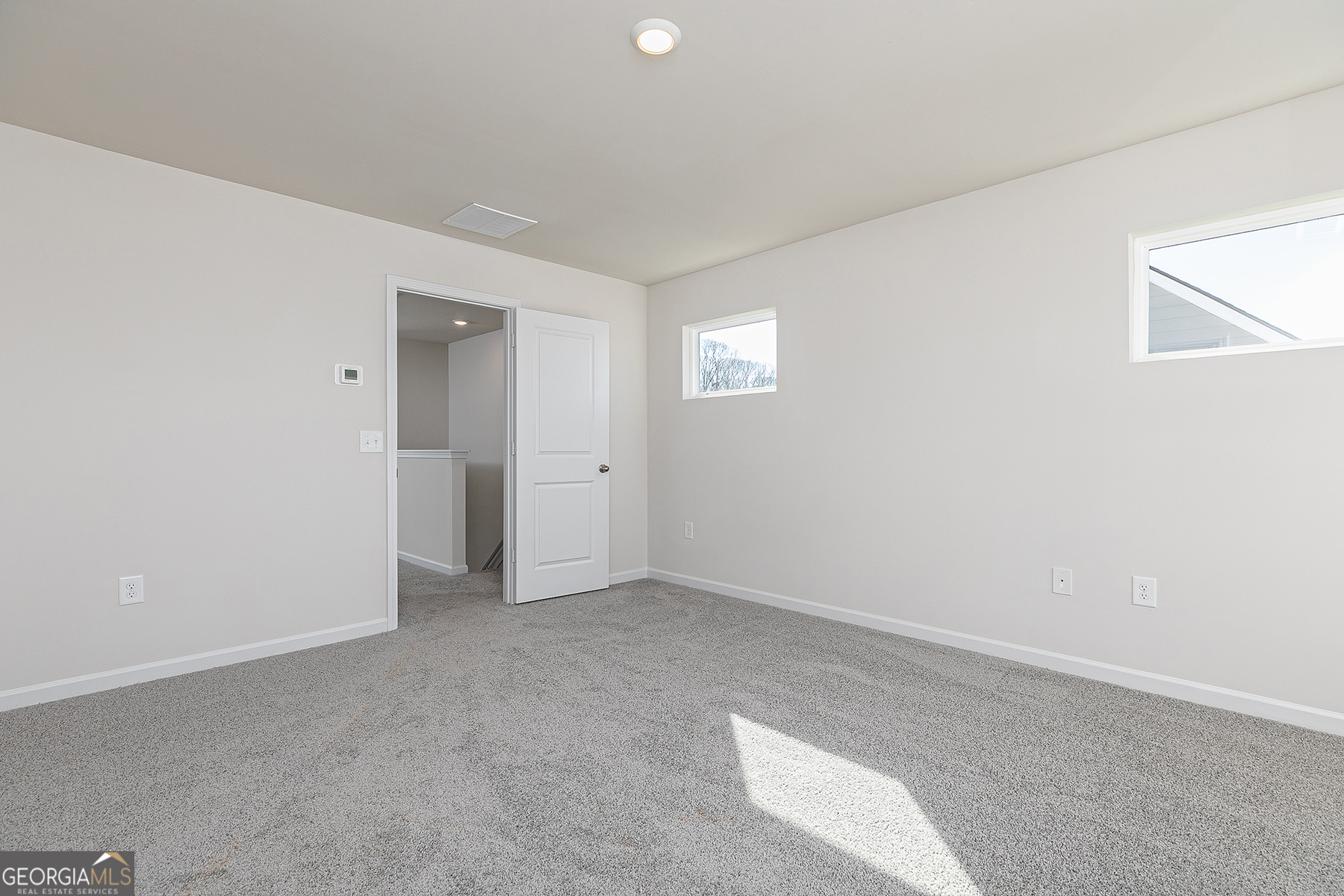 622 Mackenzie Cove Villa Rica, GA 30180 - Photo 10 of 14 a view of an empty room with a window