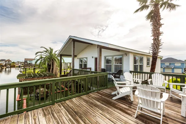 a view of a house with a lounge chair