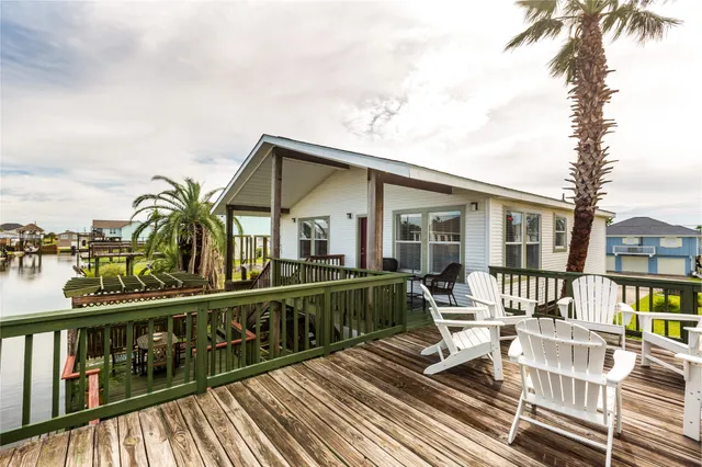 a view of a house with a lounge chair