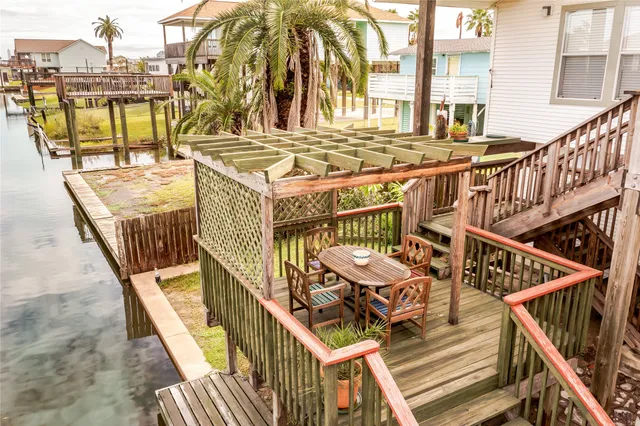 a balcony with furniture and city view