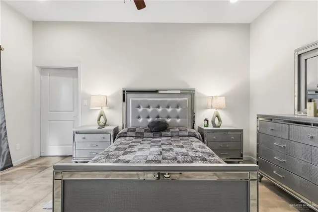 a kitchen with kitchen island sink stove and cabinets