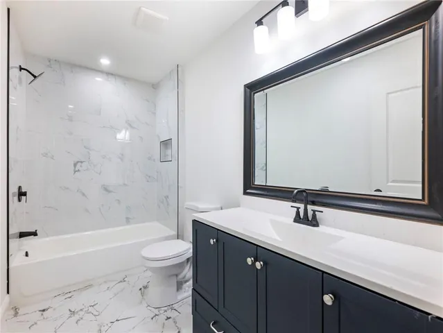 a view of a big yard with large trees