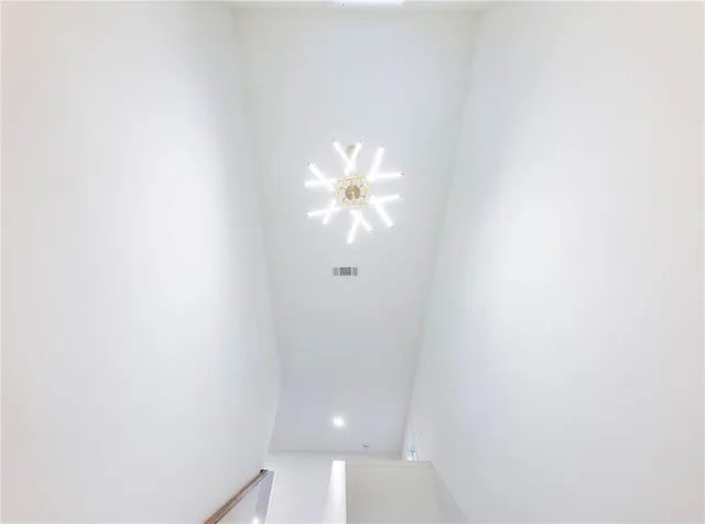 a view of a chandelier fan