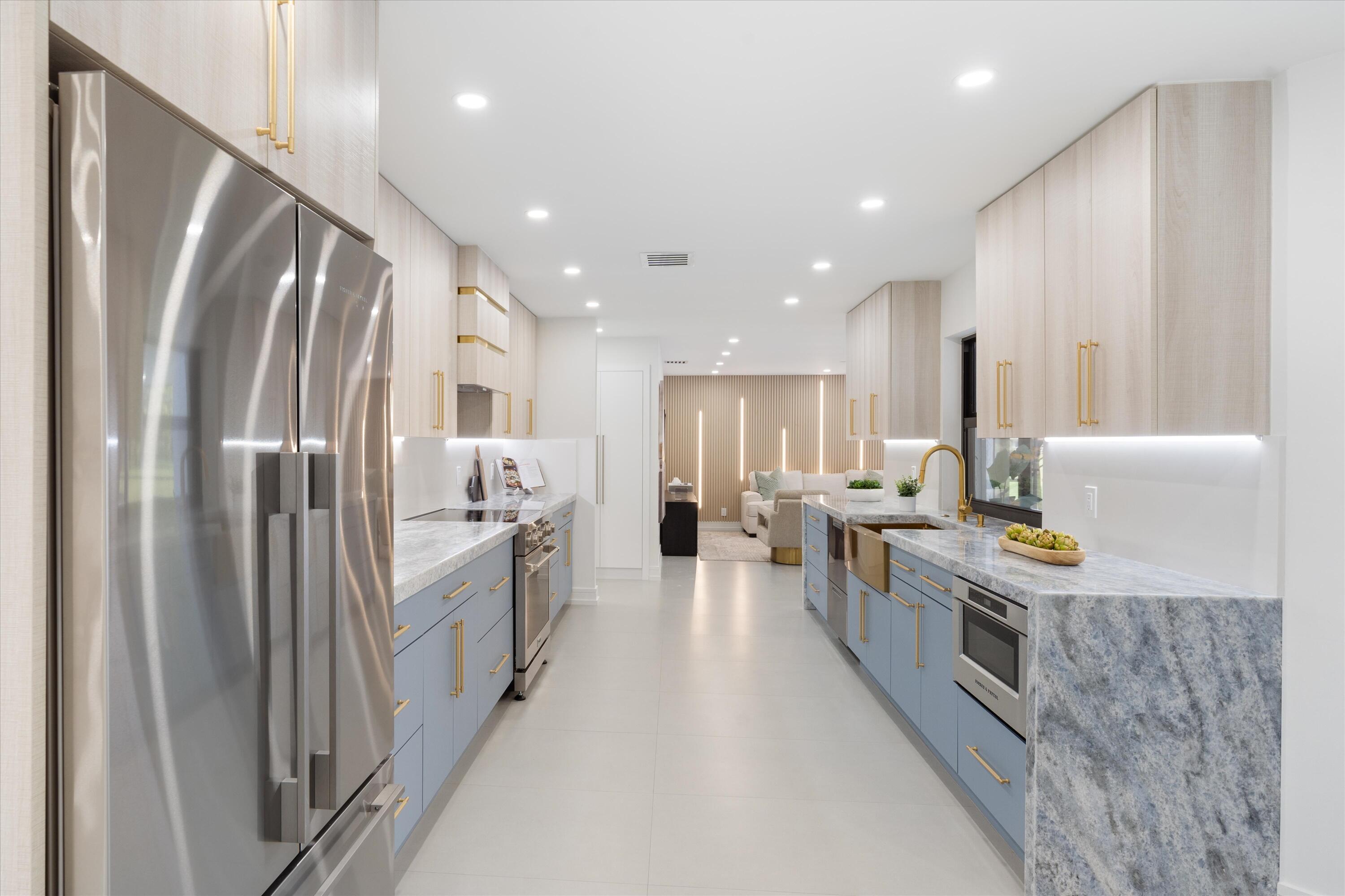 21766 Beachnut Drive Boca Raton, FL 33433 - Photo 15 of 64 a open kitchen with stainless steel appliances granite countertop lots of counter top space