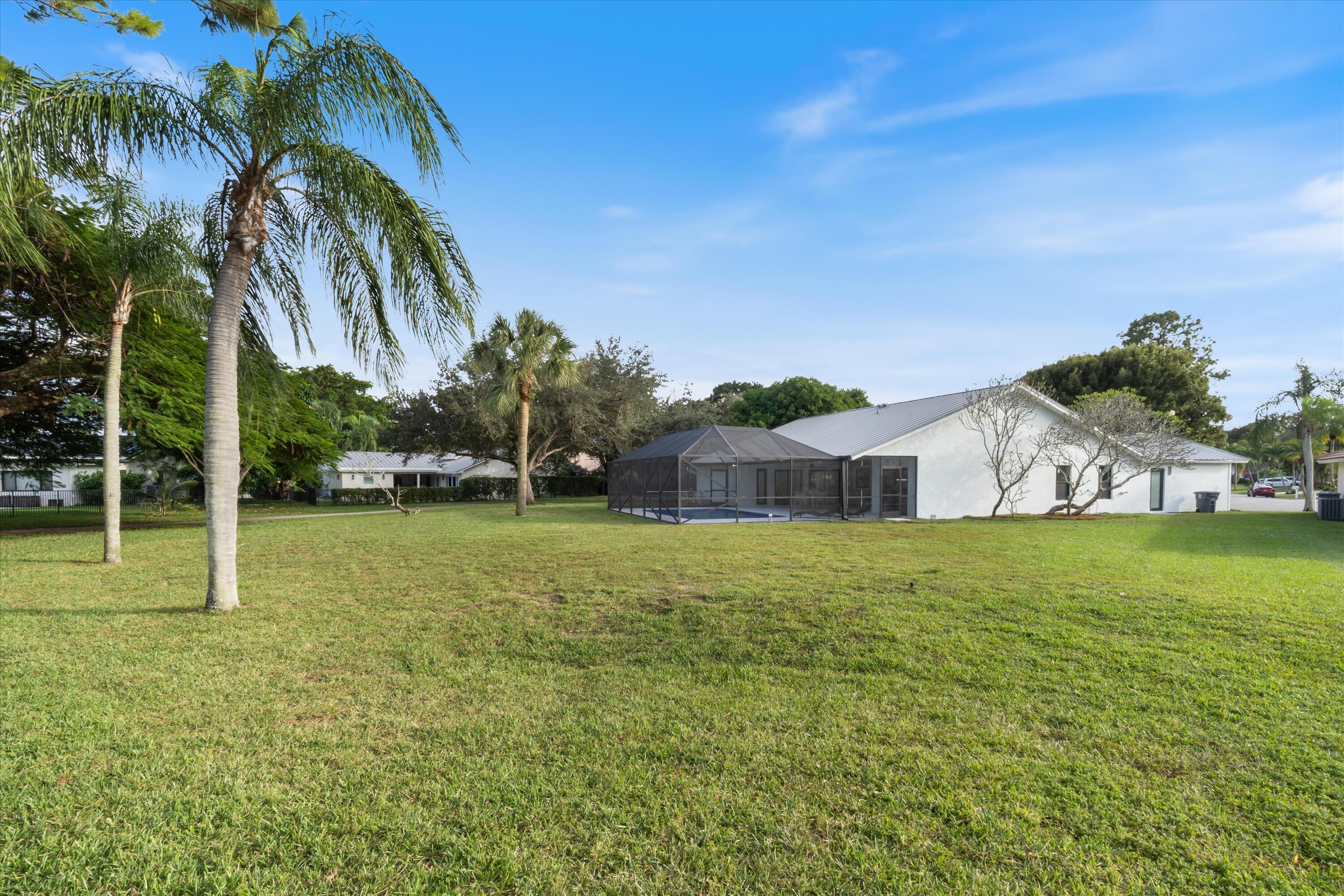 21766 Beachnut Drive Boca Raton, FL 33433 - Photo 54 of 64 a view of a house with a big yard