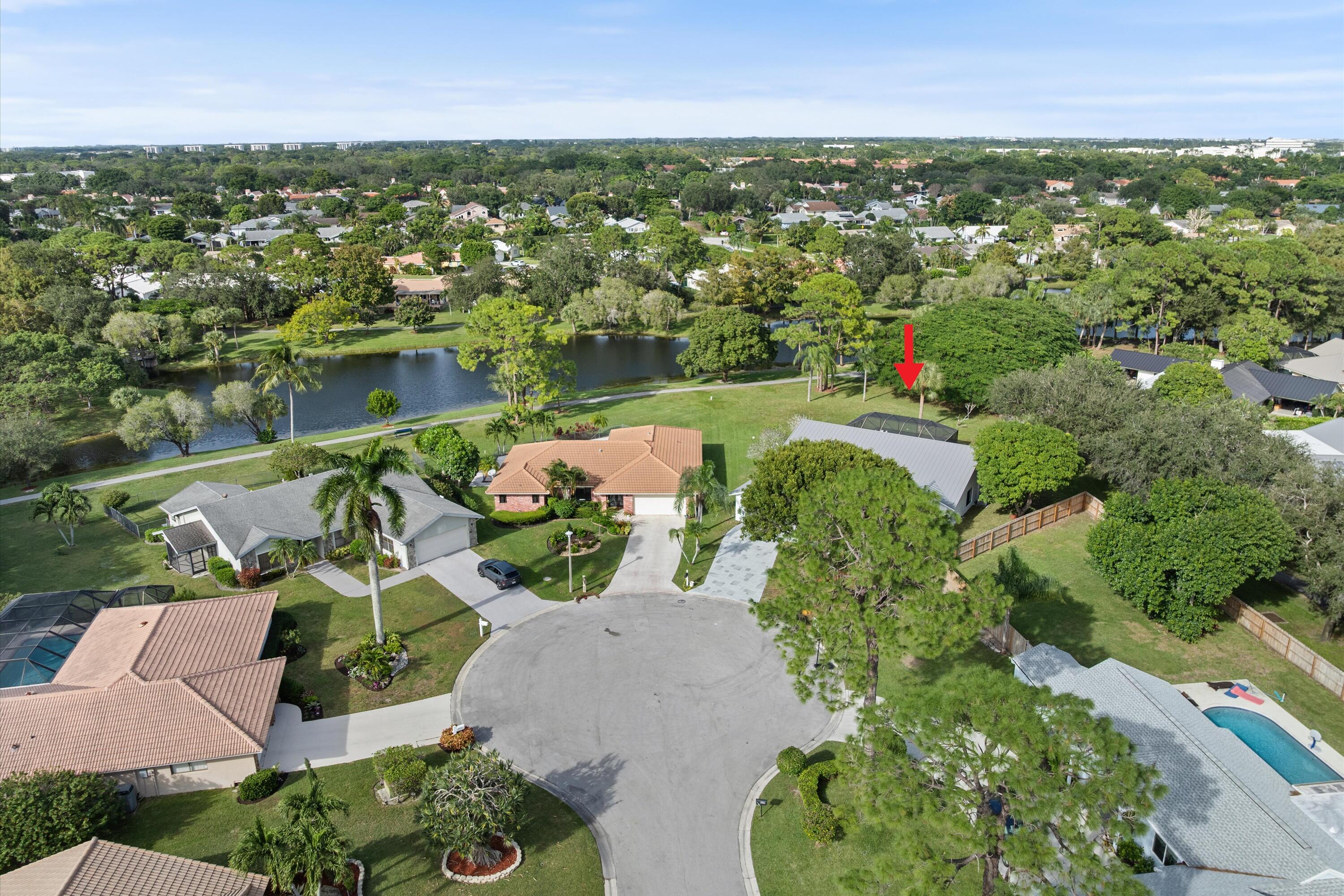 21766 Beachnut Drive Boca Raton, FL 33433 - Photo 57 of 64 an aerial view of residential houses with outdoor space and river