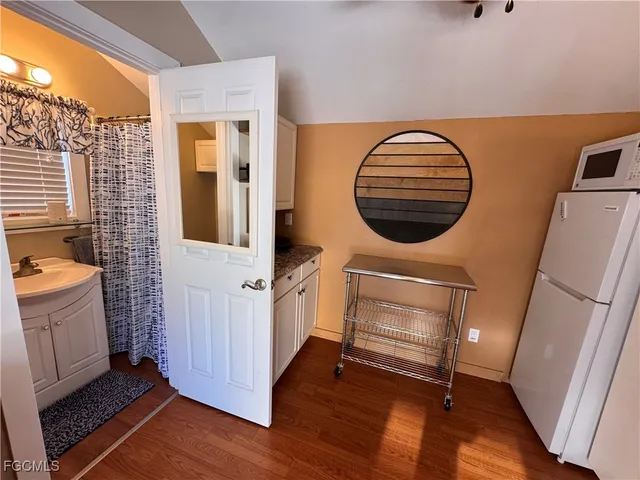 a view of a swimming pool with a yard