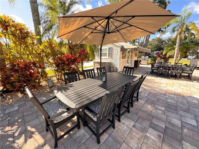 a view of a bench in a backyard