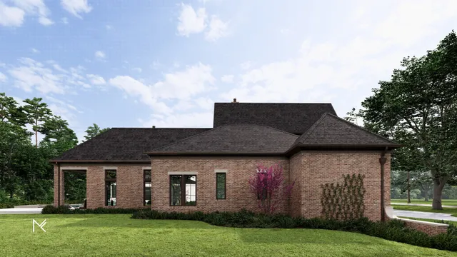 a front view of a house with a garden and yard